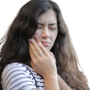 Woman holding her cheek due to painy